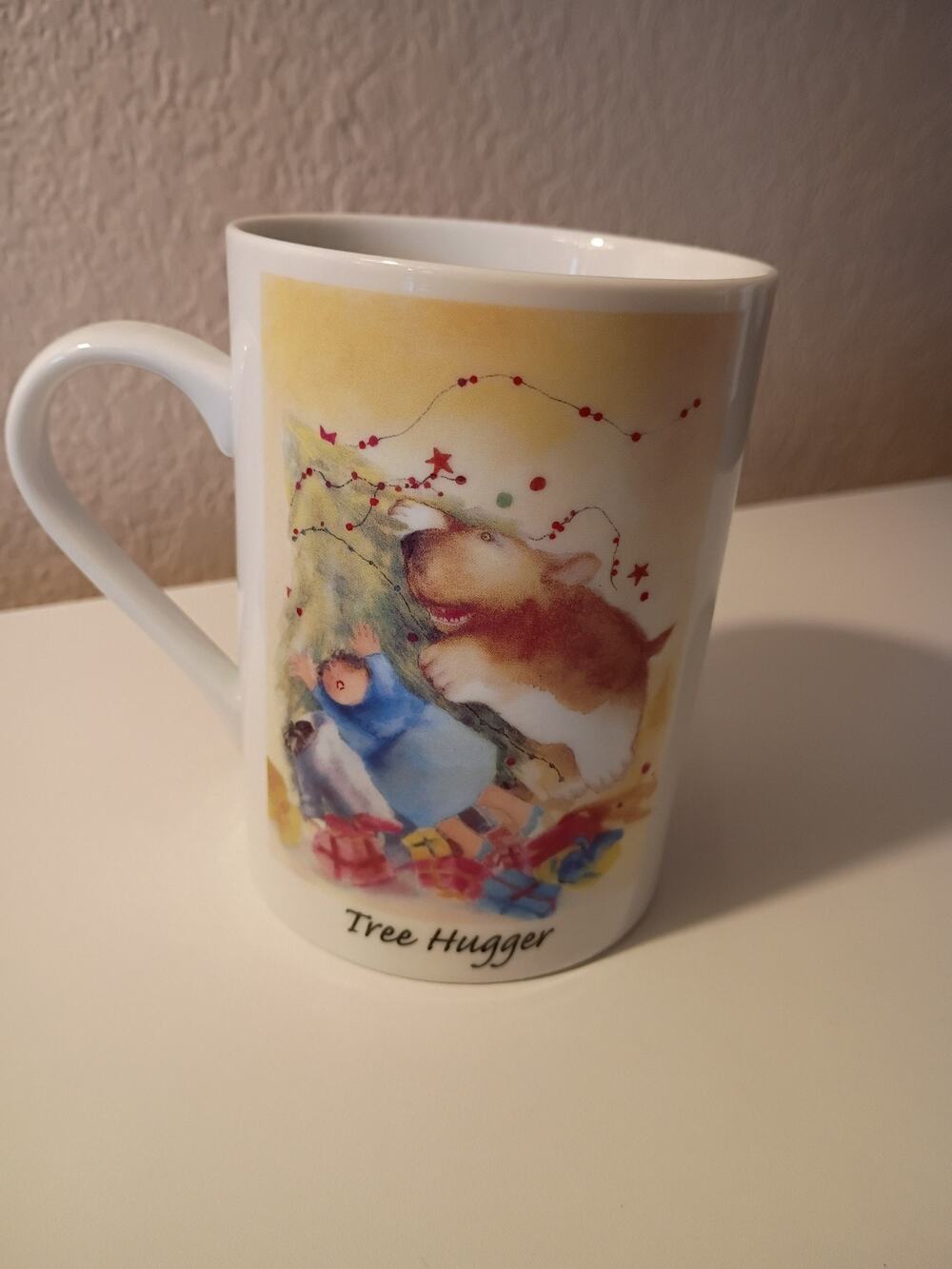 Erika Oller Artwork "Tree Hugger" Mug Cup Dog Jumping on Christmas Tree Vintage